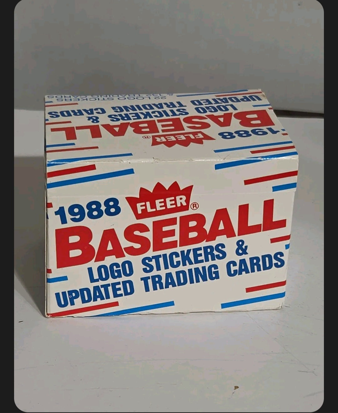 Oddly Darling Vintage 1988 Fleer baseball trading card and logo sticker display box with retro red and blue graphics