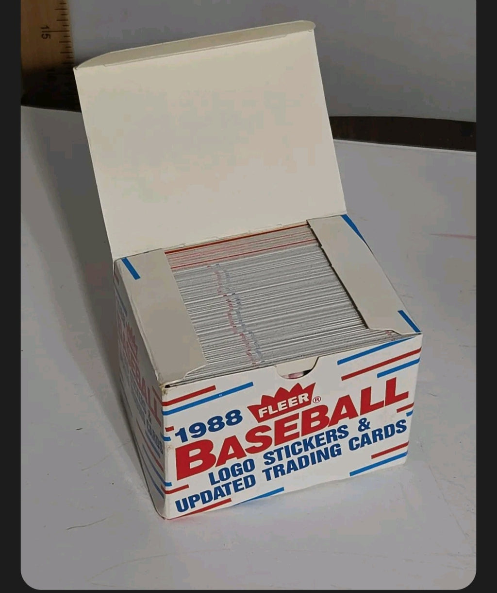 Oddly Darling Vintage 1988 Fleer baseball trading card display box with red and blue retro graphics and logo stickers.