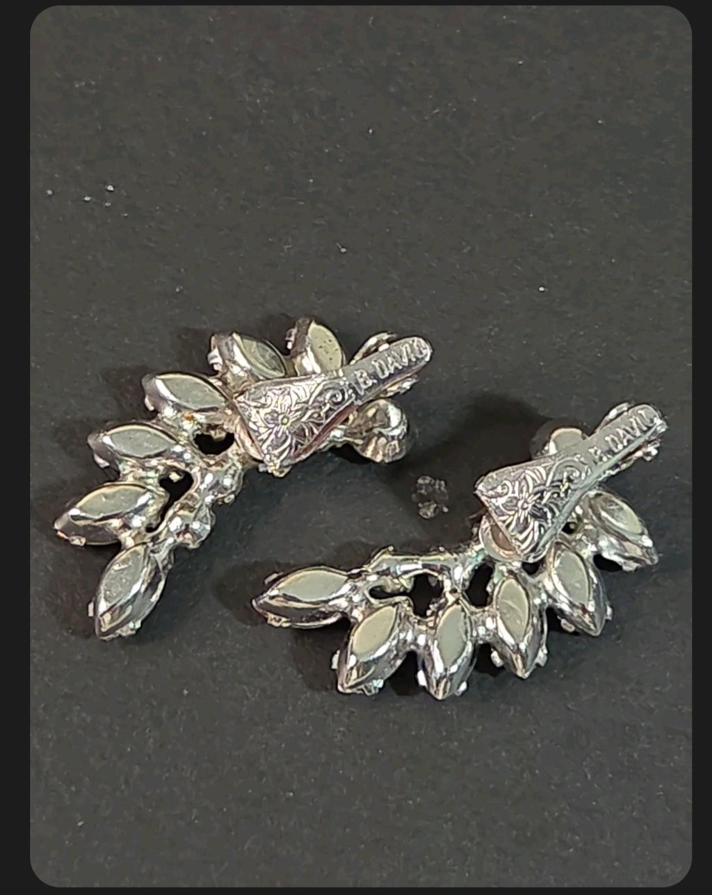 Oddly Darling Vintage B. David clip-on ear climber earrings featuring blue marquise rhinestones in silver-tone metal.