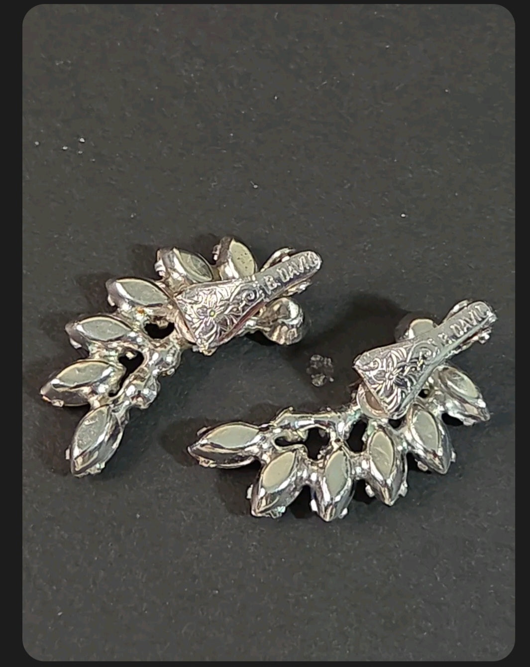 Oddly Darling Vintage B. David clip-on ear climber earrings featuring blue marquise rhinestones in silver-tone metal.