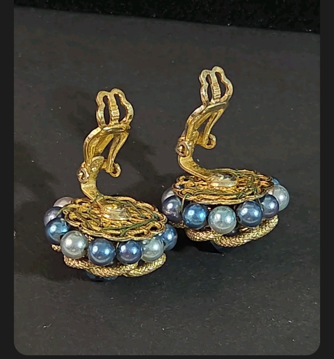 Oddly Darling Vintage mid-century clip-on earrings with blue and grey faux pearls and gold-tone metal cluster design.