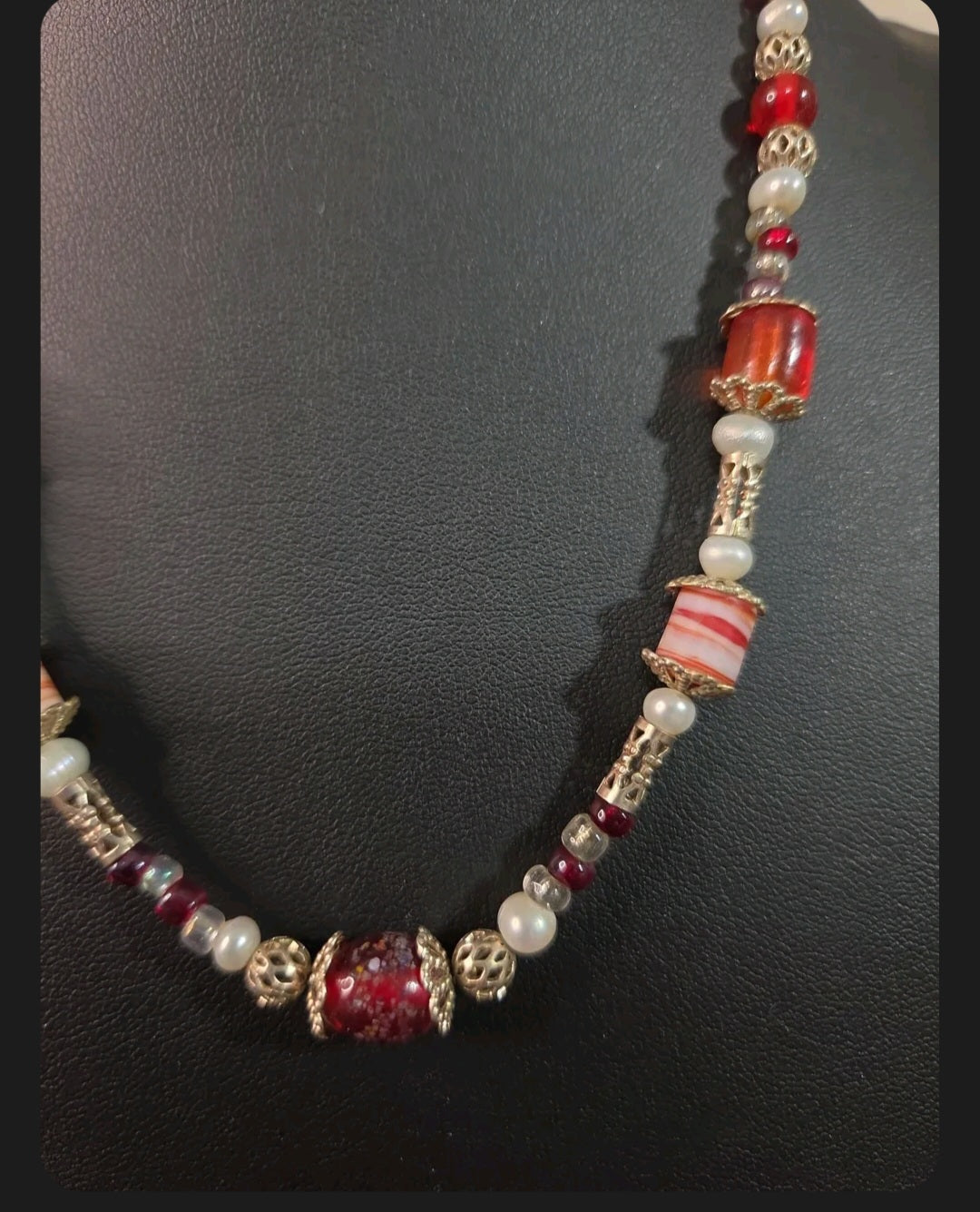 Oddly Darling Vintage statement necklace featuring crimson red glass beads, white pearls, and gold-tone filigree spacers.