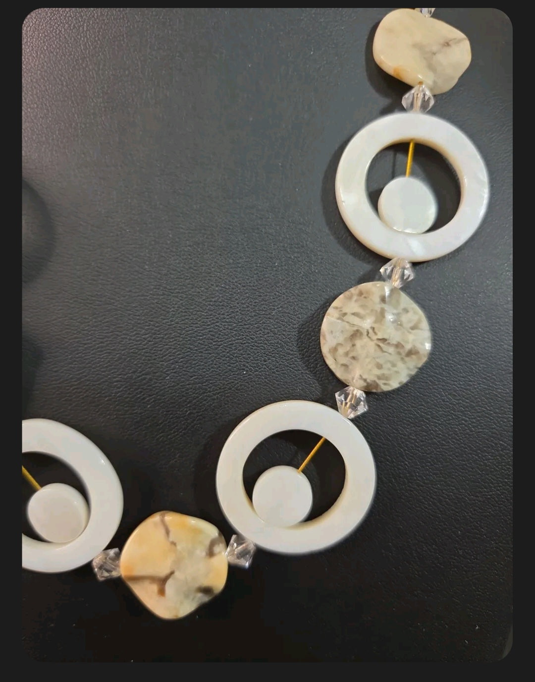 Oddly Darling Vintage artisan statement necklace featuring mother-of-pearl discs, stone beads, and crystal accents.