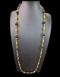 Oddly Darling Vintage long necklace with alternating polished black beads and textured gold-tone metal spacers
