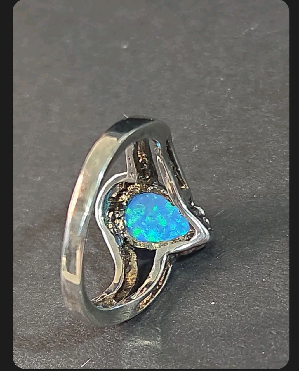 Oddly Darling Vintage pear-shaped blue opal statement ring with a textured silver-tone split-shank band.