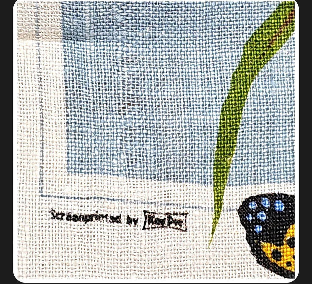 Oddly Darling Vintage linen tea towel featuring a screen-printed butterfly and green leaf on a textured fabric