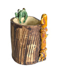 Oddly Darling Vintage handcrafted ceramic tree stump vessel with a green frog and bamboo accent for desk organization.