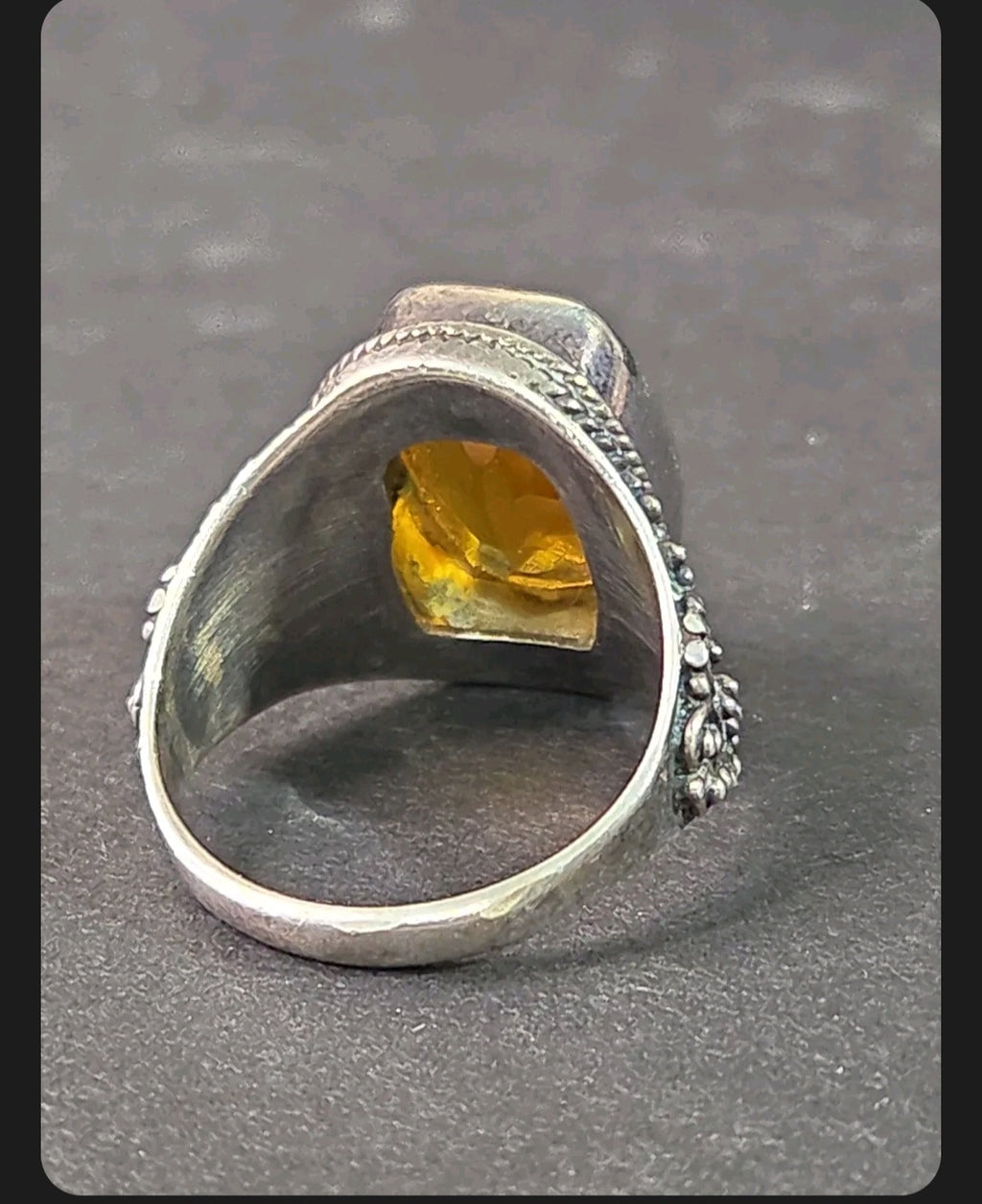 Oddly Darling Vintage ornate sterling silver statement ring featuring a cushion-cut citrine with intricate scrollwork