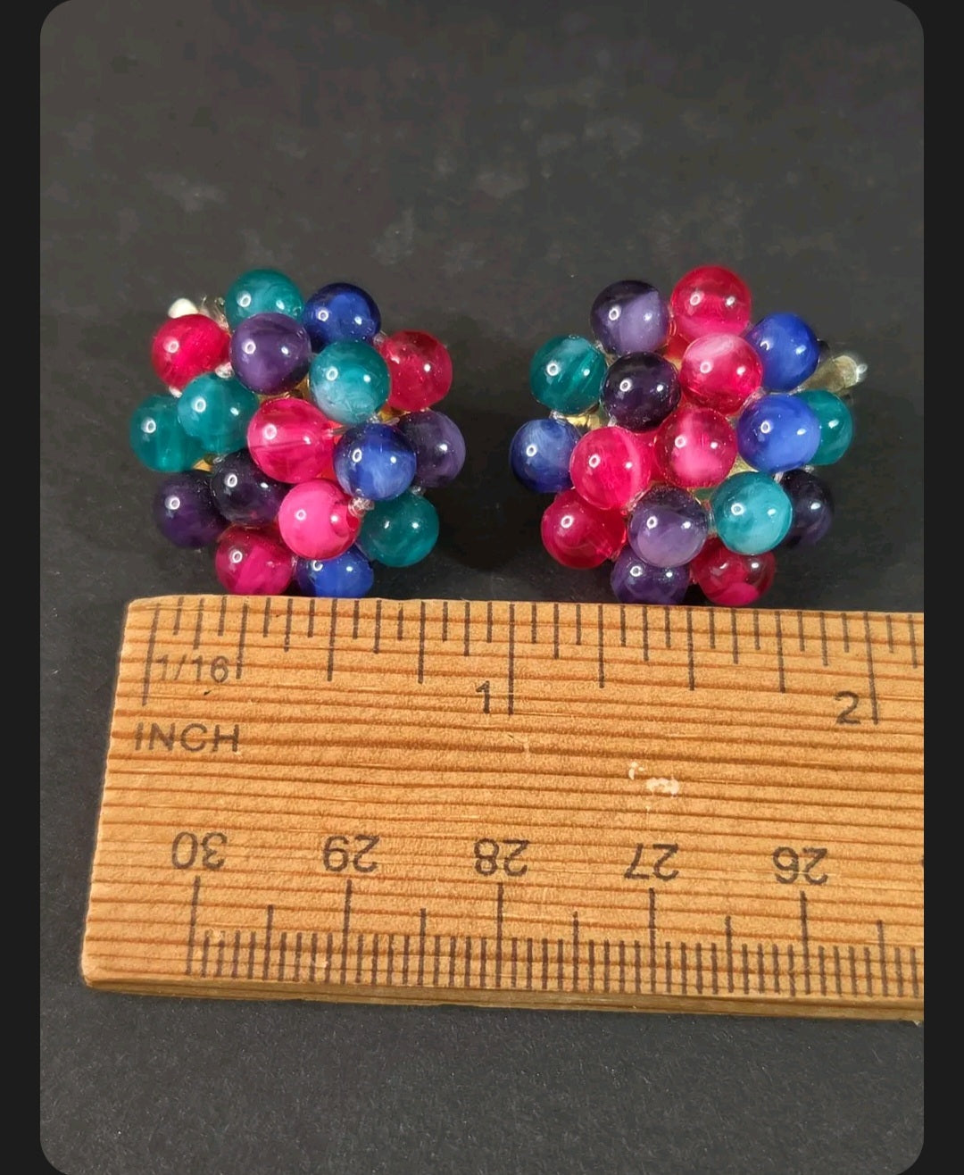 Oddly Darling Vintage multi-colored cluster bead clip-on earrings with magenta, teal, blue, and purple spheres.