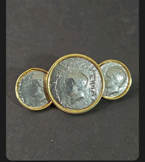 Oddly Darling Vintage statement brooch featuring three antique silver coin medallions in polished gold-tone settings.