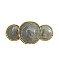 Oddly Darling Vintage statement brooch featuring three antique silver coin medallions in polished gold-tone settings.