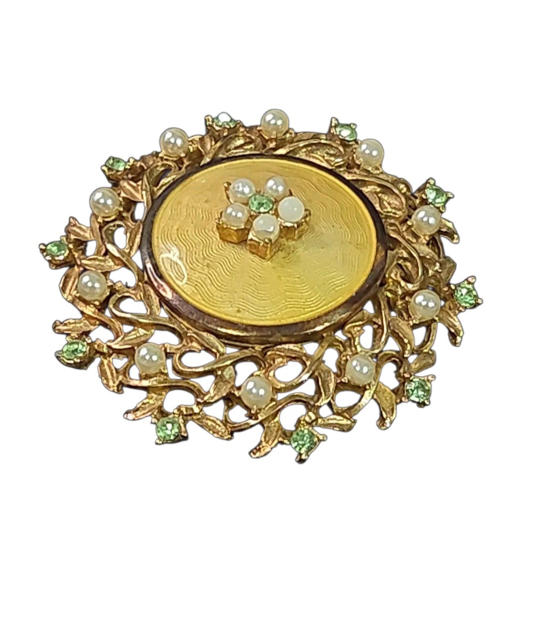 Oddly Darling Vintage Coro brooch featuring gold guilloché enamel, faux pearls, and green rhinestones in a floral motif