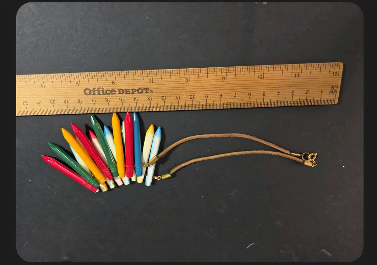 Oddly Darling Vintage crayon statement necklace with multi-colored pendants on a tan leather cord and gold hardware