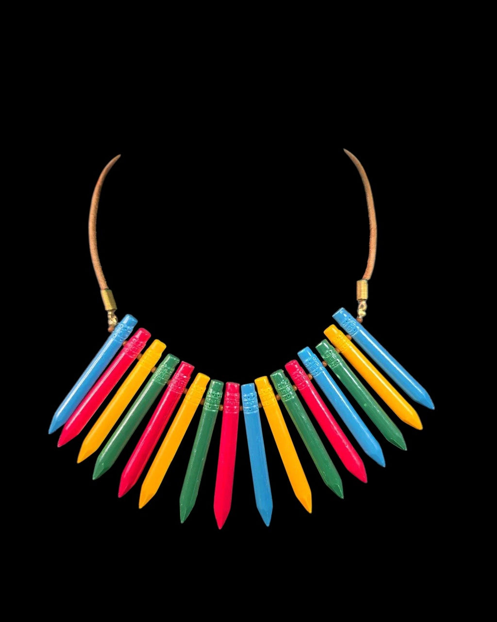 Oddly Darling Vintage crayon statement necklace with colorful pendants on a leather cord and gold-tone hardware.