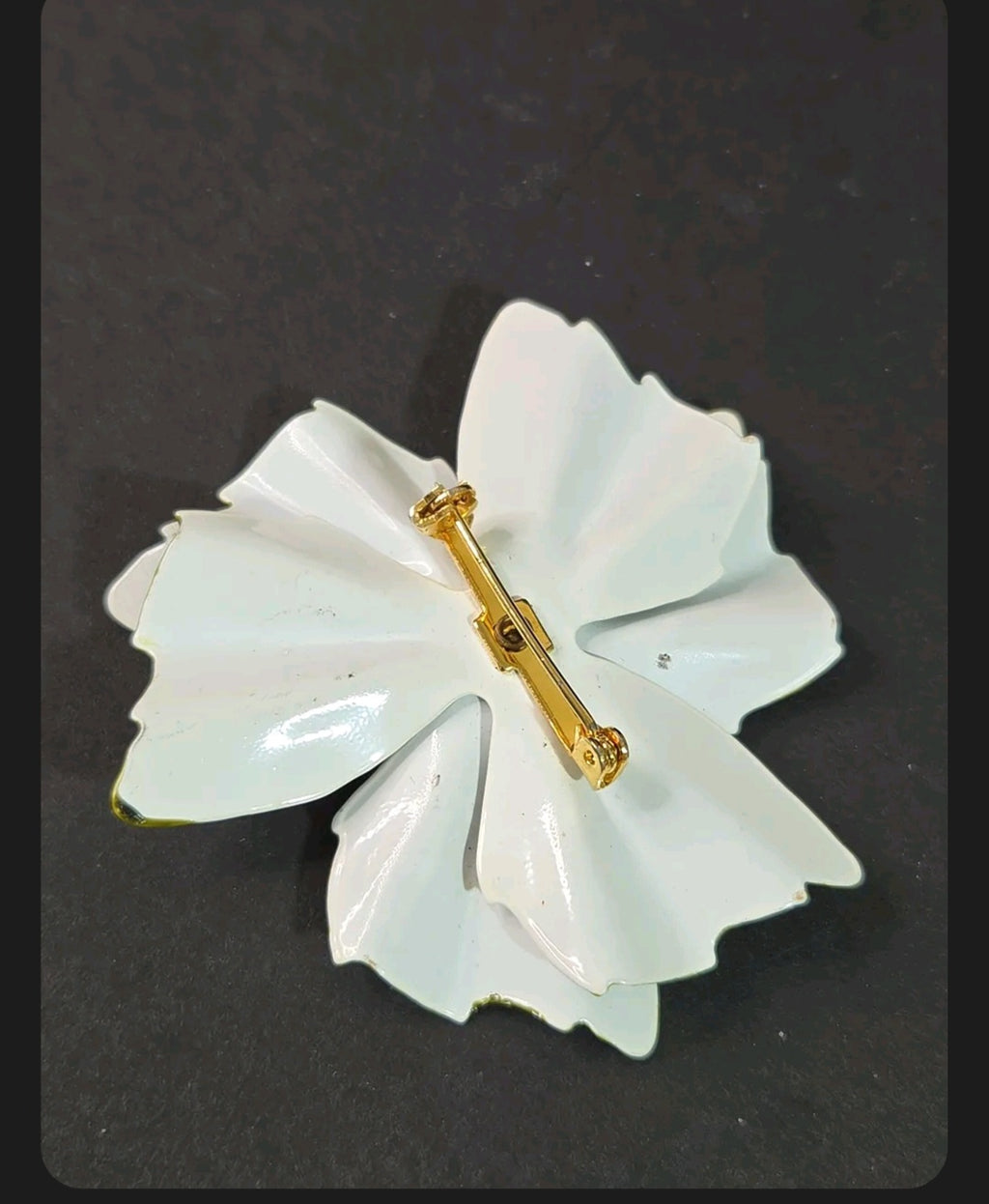 Oddly Darling Vintage enamel flower brooch back view showing the secure gold-tone pin closure on white petals.