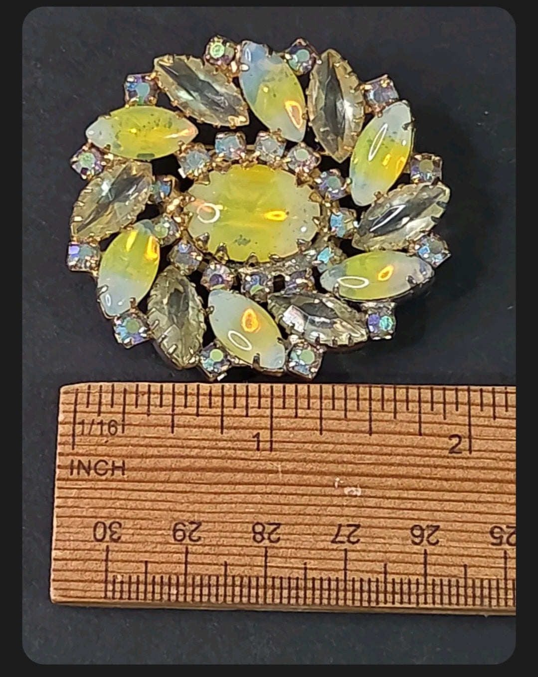 Oddly Darling Vintage floral brooch with iridescent marquise stones, central cabochon, and gold-tone setting.