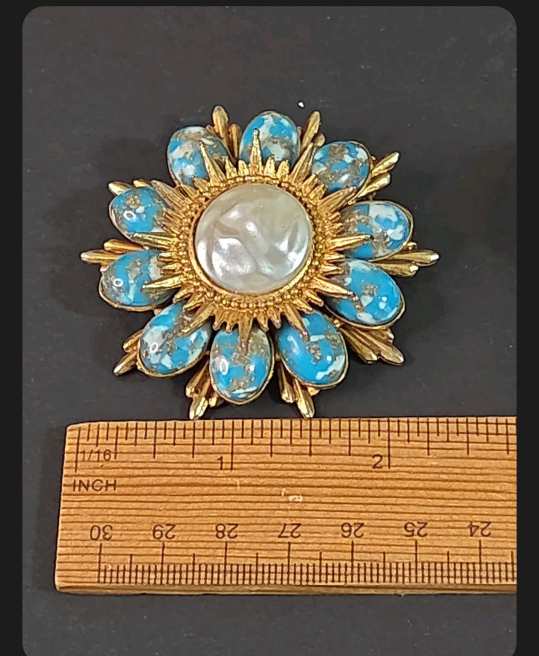Oddly Darling Vintage floral statement brooch with a central cabochon and turquoise marbled stones in brushed gold.