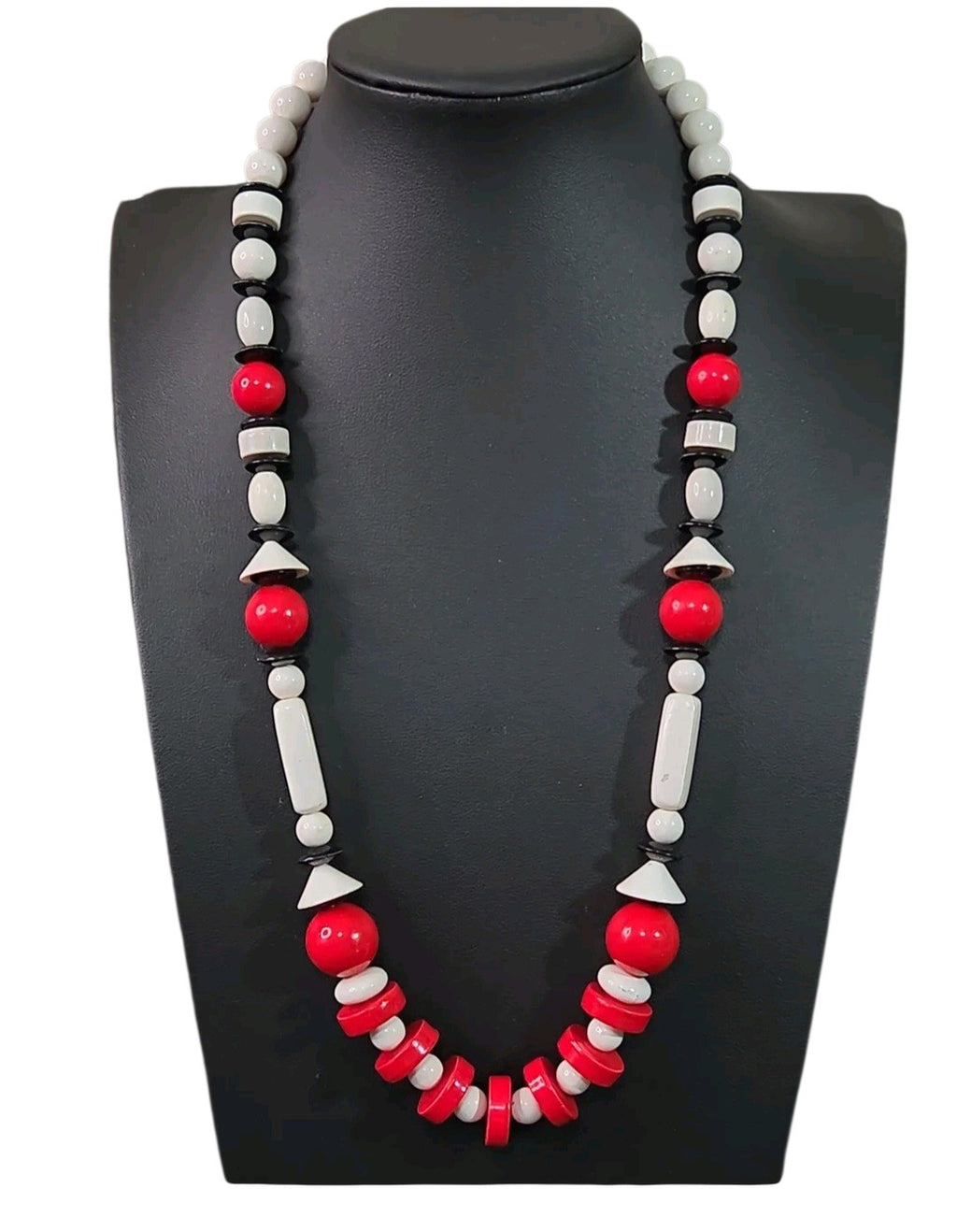 Oddly Darling Vintage geometric statement necklace featuring red, white, and black beads in sphere and disc shapes.