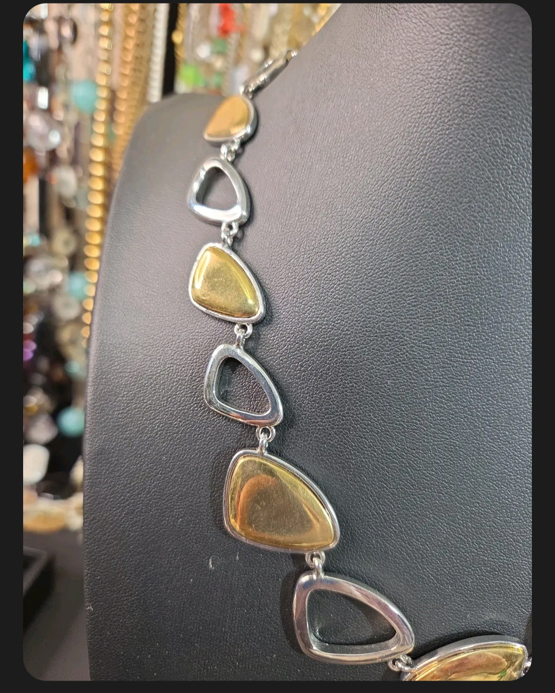 Oddly Darling Vintage mixed-metal statement necklace with alternating polished silver and gold geometric links.