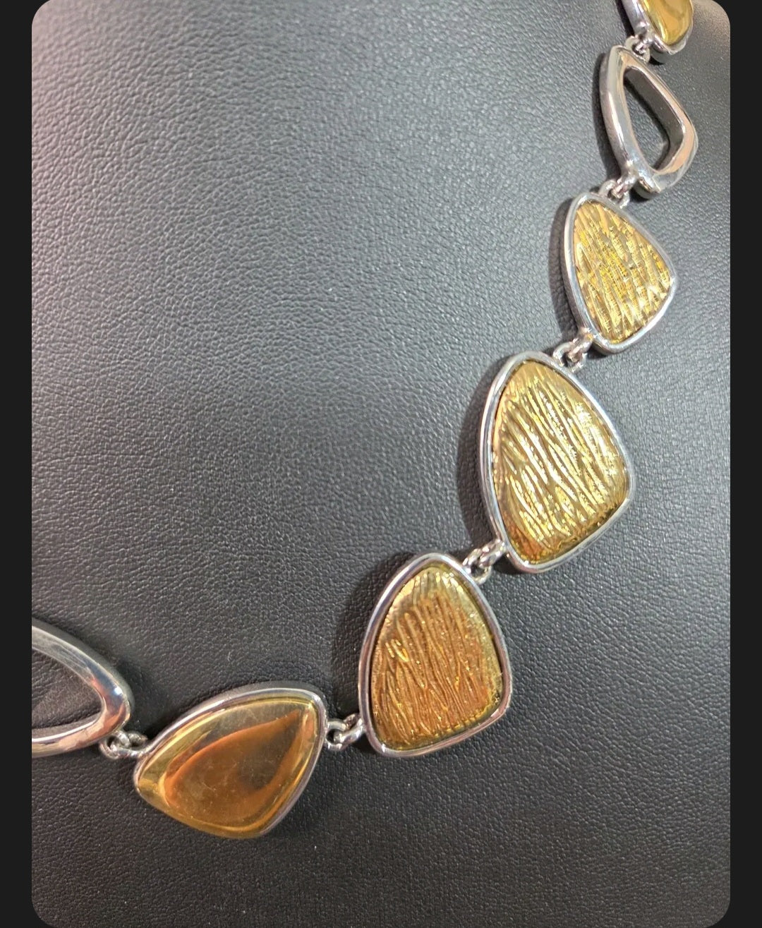 Oddly Darling Vintage mixed-metal statement necklace featuring textured gold-tone and polished silver-tone geometric links