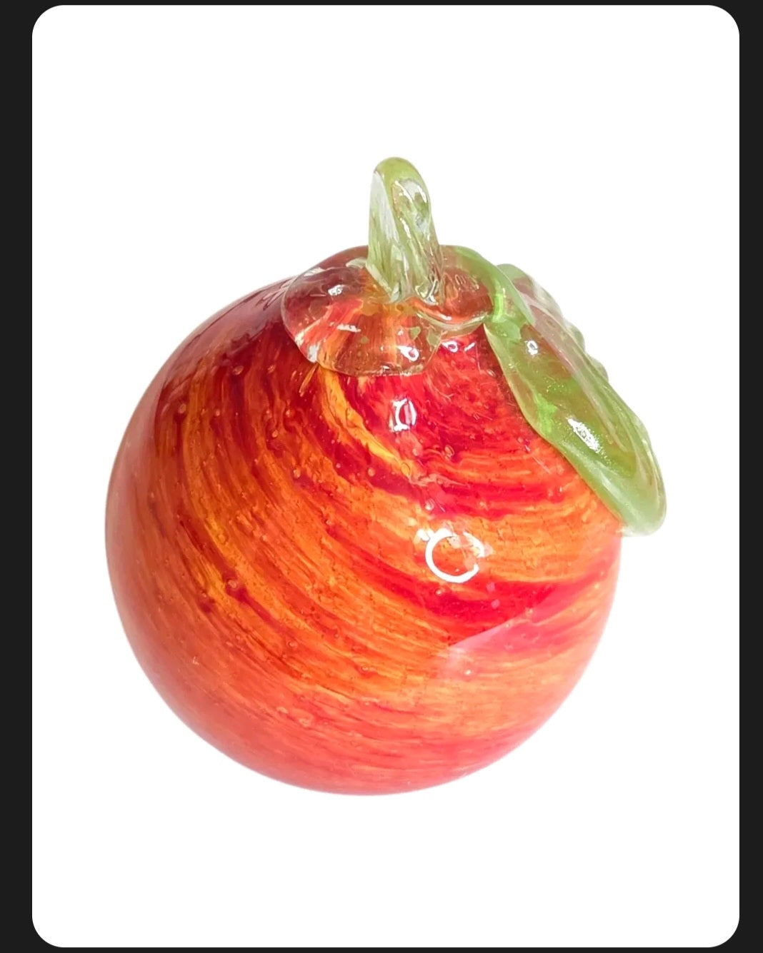 Oddly Darling Vintage hand blown glass apple paperweight in sunset orange and red with a green glass leaf detail.