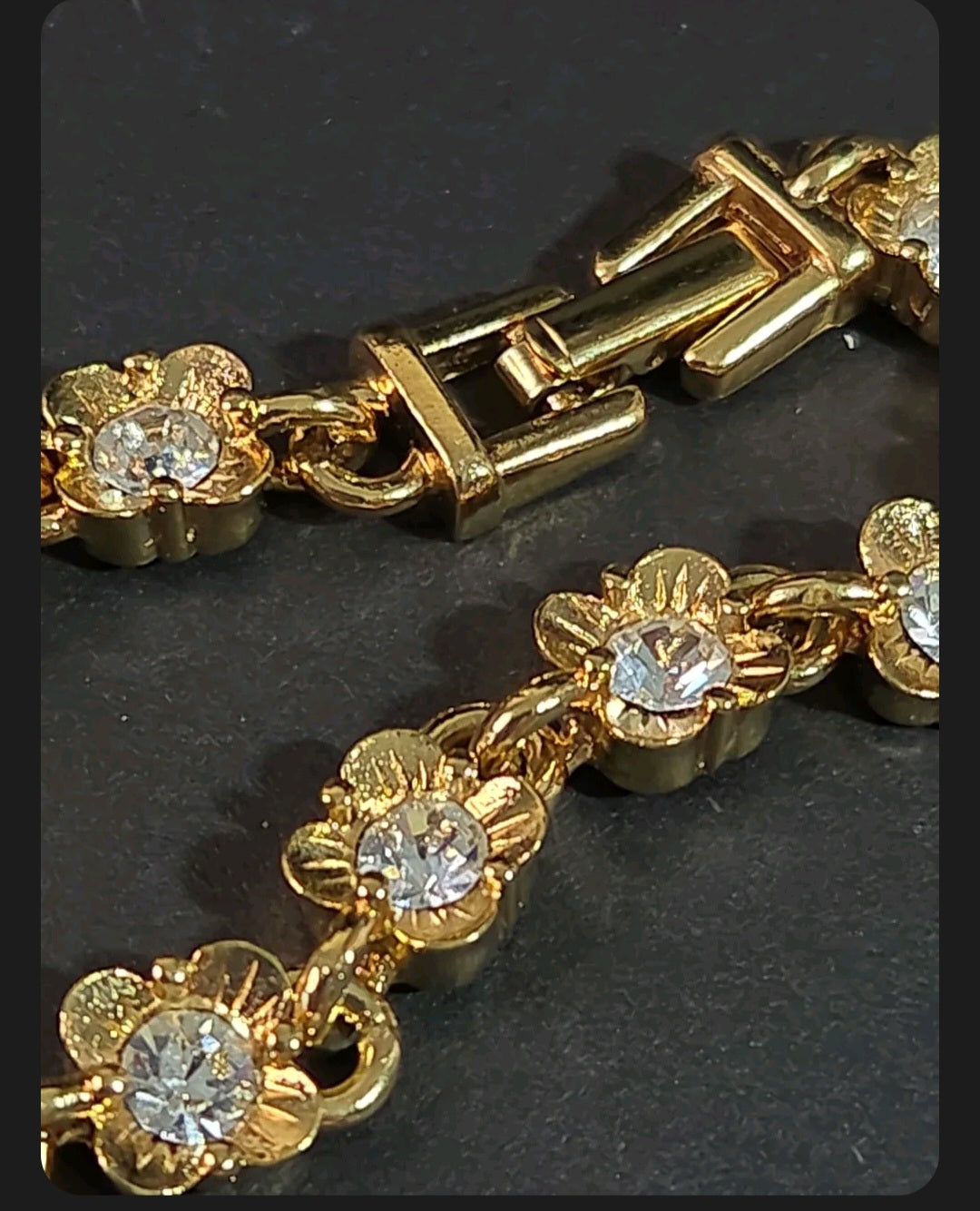 Oddly Darling Vintage gold-tone floral link bracelet with clear crystal centers and a secure fold-over clasp
