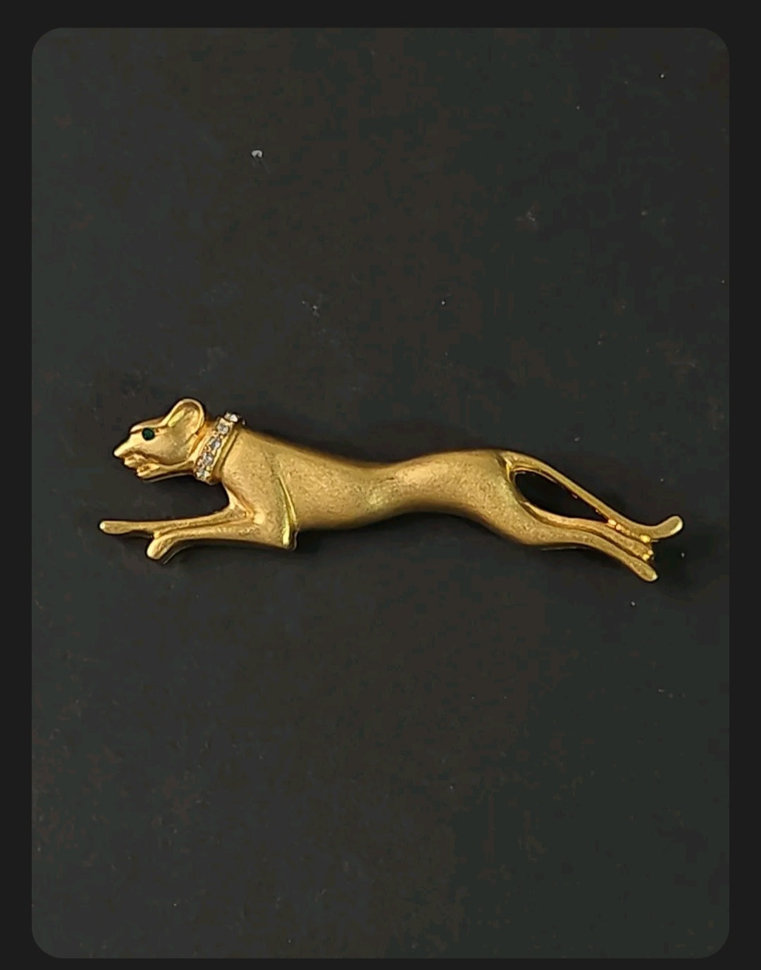 Oddly Darling Vintage brushed gold-tone panther brooch with a crystal collar and emerald-green eye detail.
