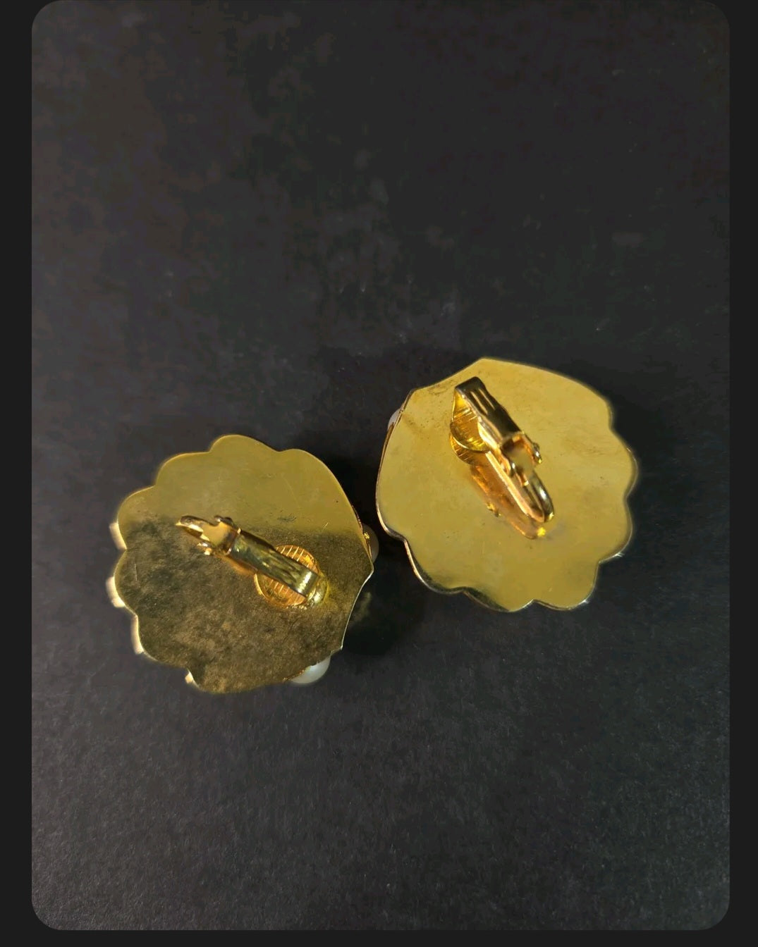 Oddly Darling Vintage gold-tone shell clip-on earrings with secure backings shown from the reverse side