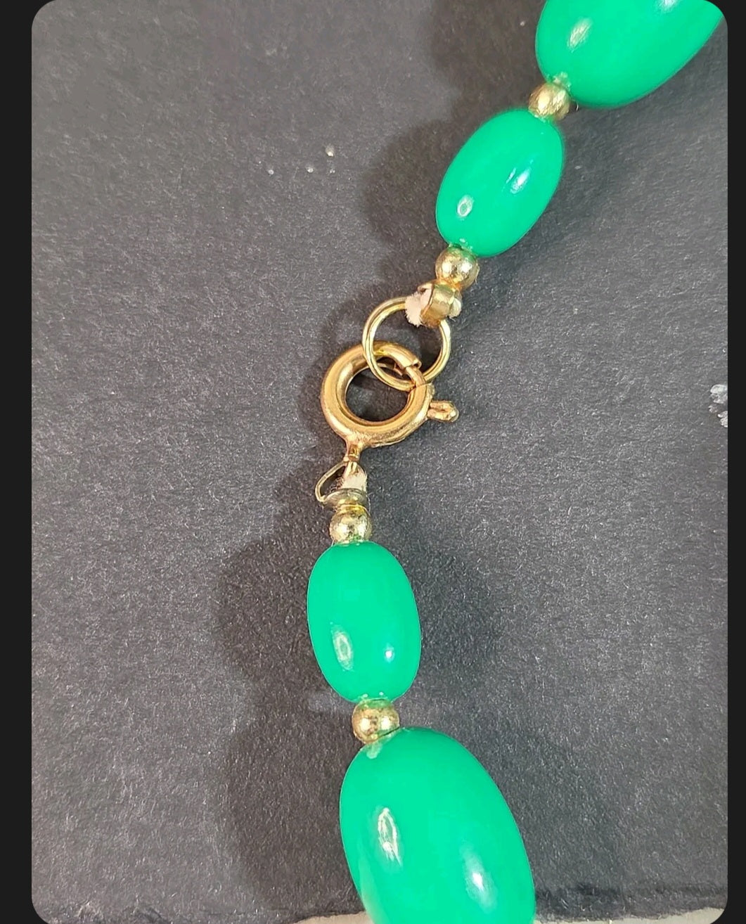 Oddly Darling Vintage emerald green oval bead necklace with gold-tone spring ring clasp and small spacer beads