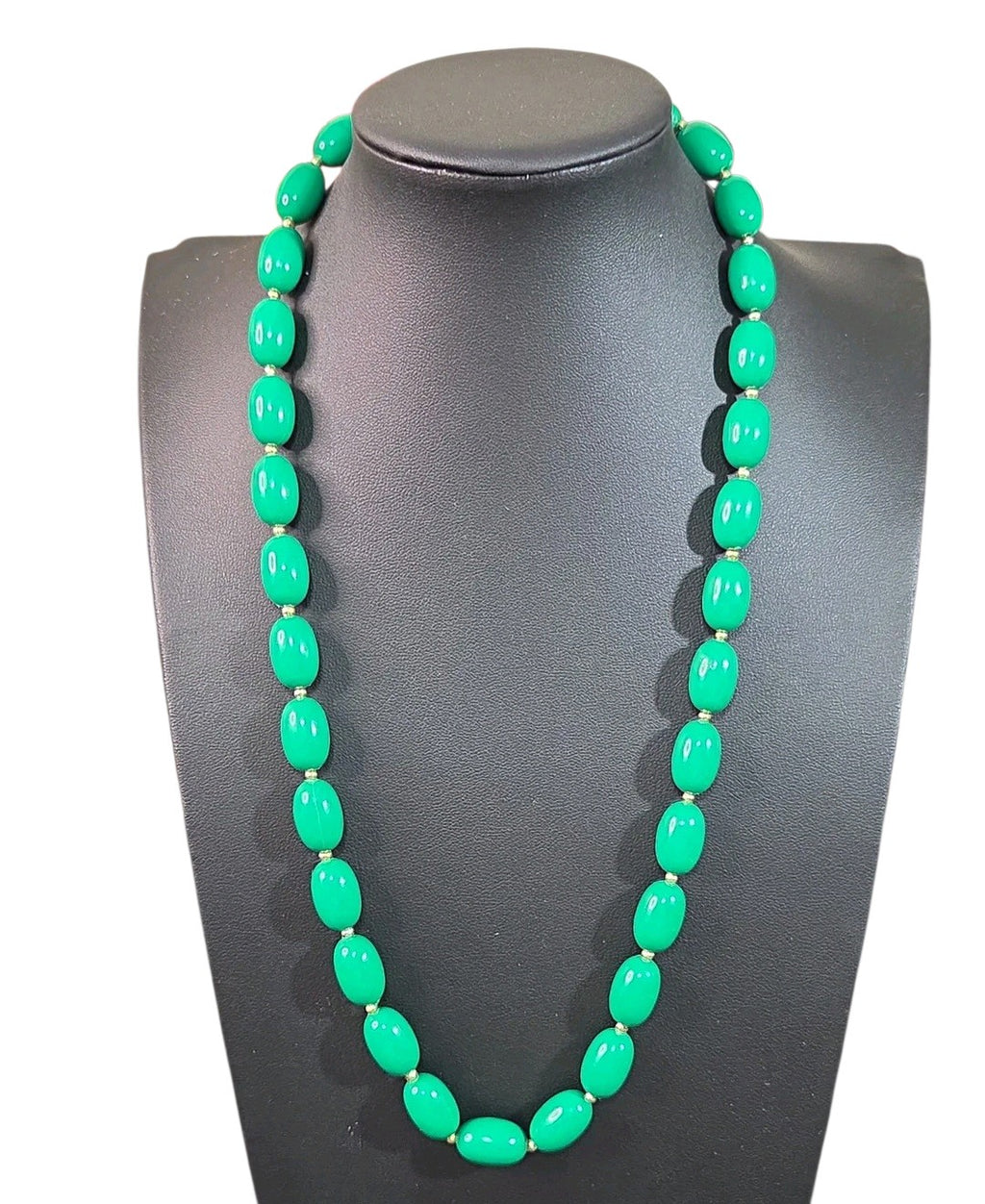 Oddly Darling Vintage emerald green oval bead necklace with small gold-tone spacers on a black display bust.