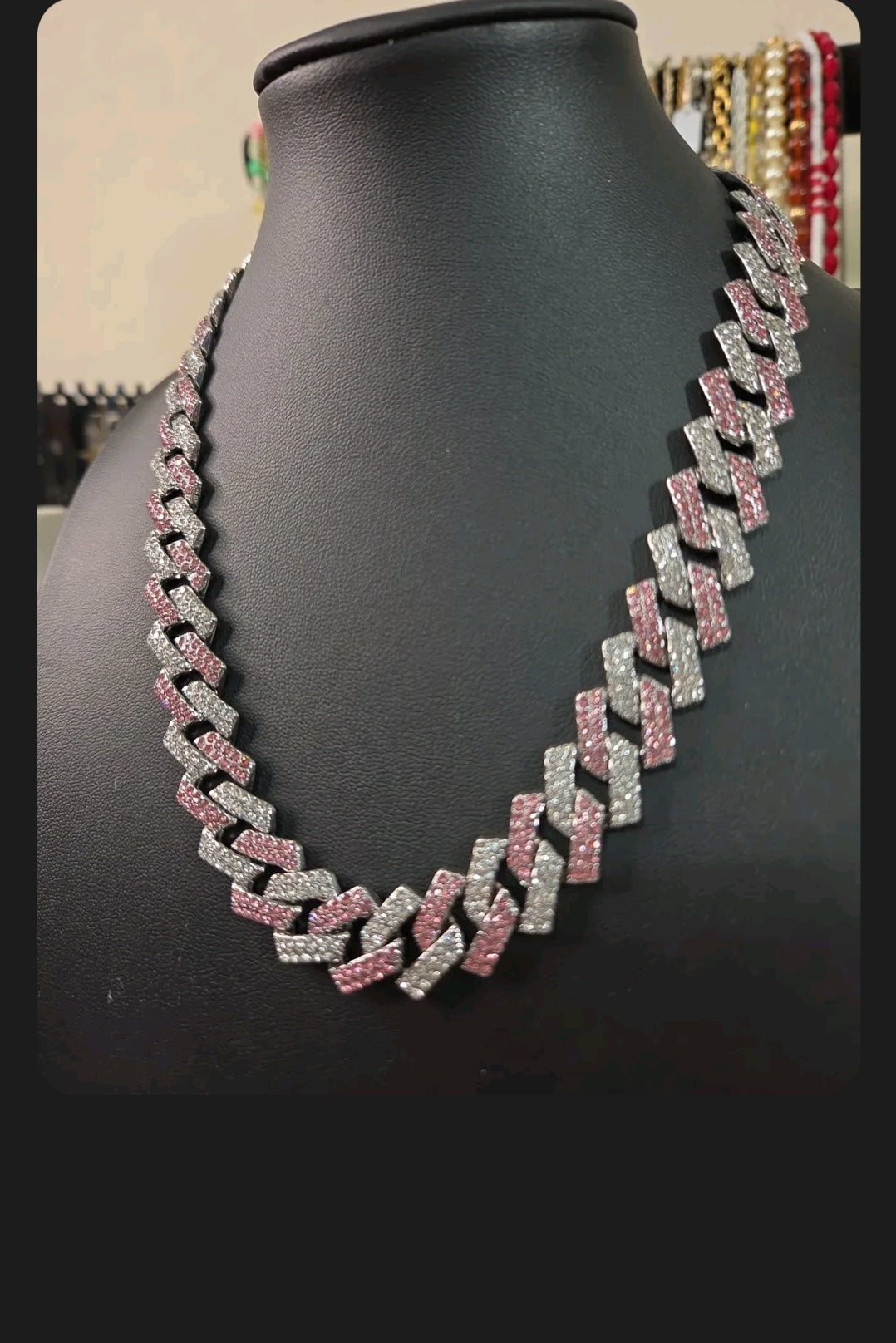 Oddly Darling Vintage iced-out cuban link necklace with alternating clear and pink crystal embellishments.