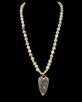 Oddly Darling Vintage beaded necklace featuring iridescent Labradorite beads and a gold-tone heart pendant.