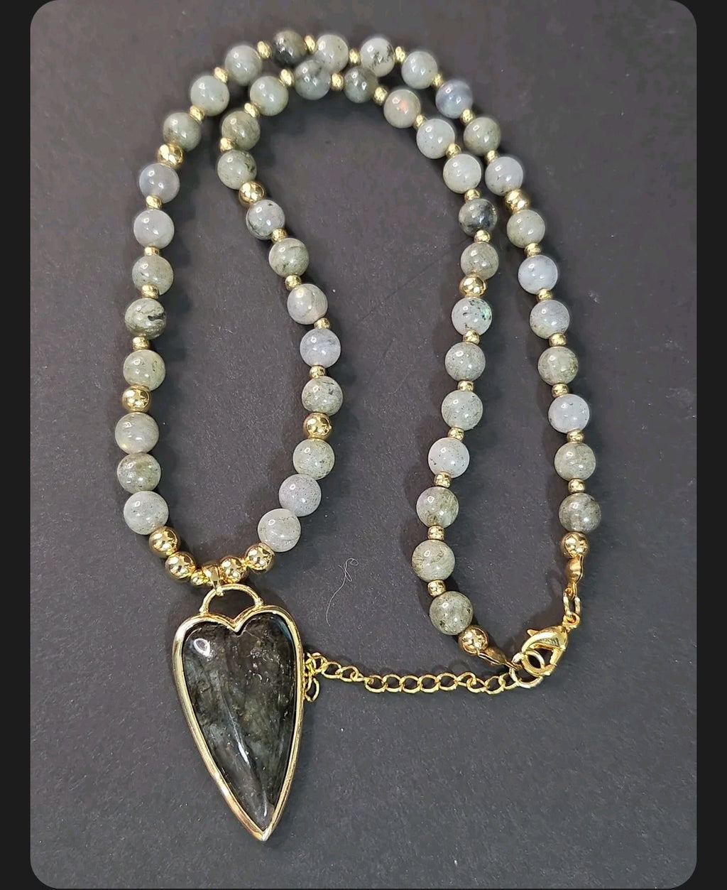 Oddly Darling Vintage beaded necklace featuring iridescent Labradorite beads and a heart-shaped pendant in gold frame.