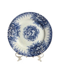 Oddly Darling Vintage Lunéville ceramic plate featuring a blue floral transferware pattern on an off-white background.