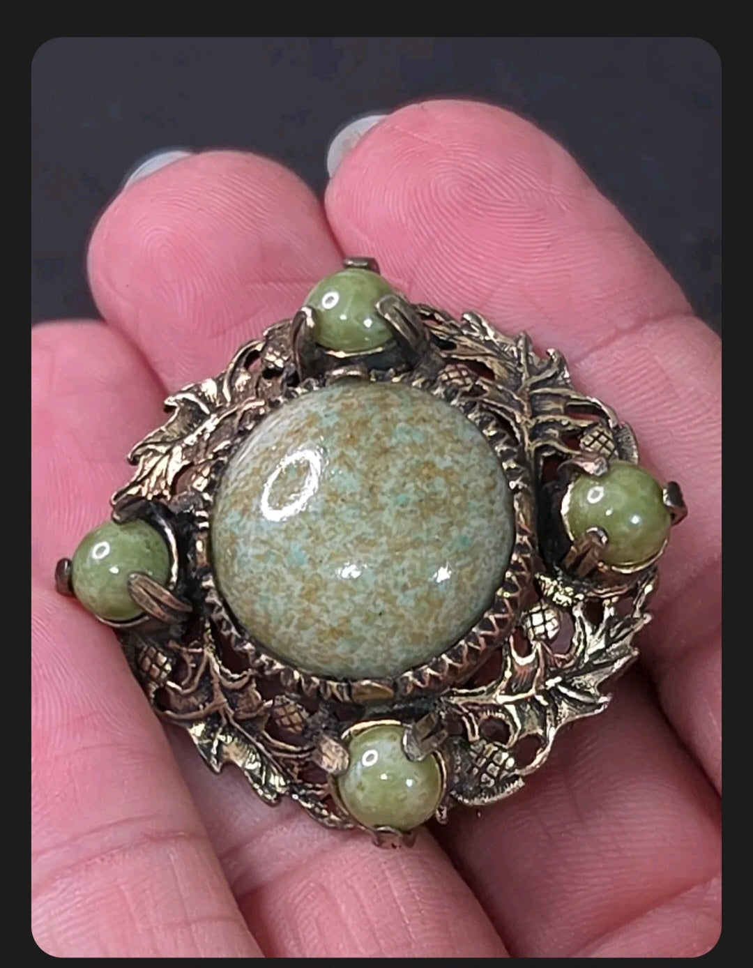 Oddly Darling Vintage Miracle brooch with sage green mottled cabochon stones and antique gold leaf and acorn filigree