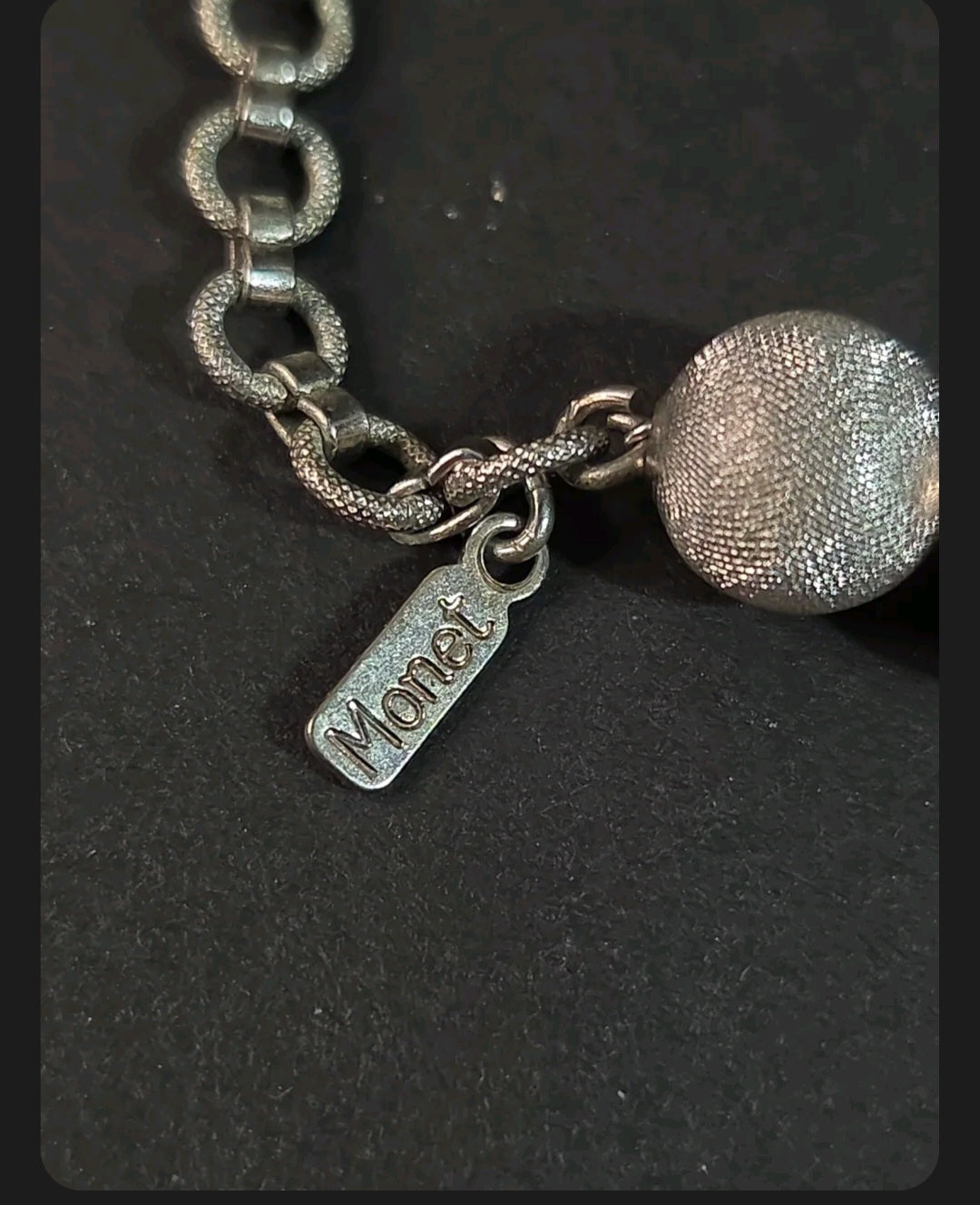 Oddly Darling Vintage Monet silver-tone textured bead necklace with signature brand tag and chain link detail