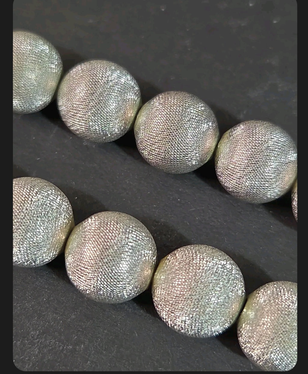 Oddly Darling Vintage Monet silver-tone statement necklace featuring textured spherical beads with a brushed finish.