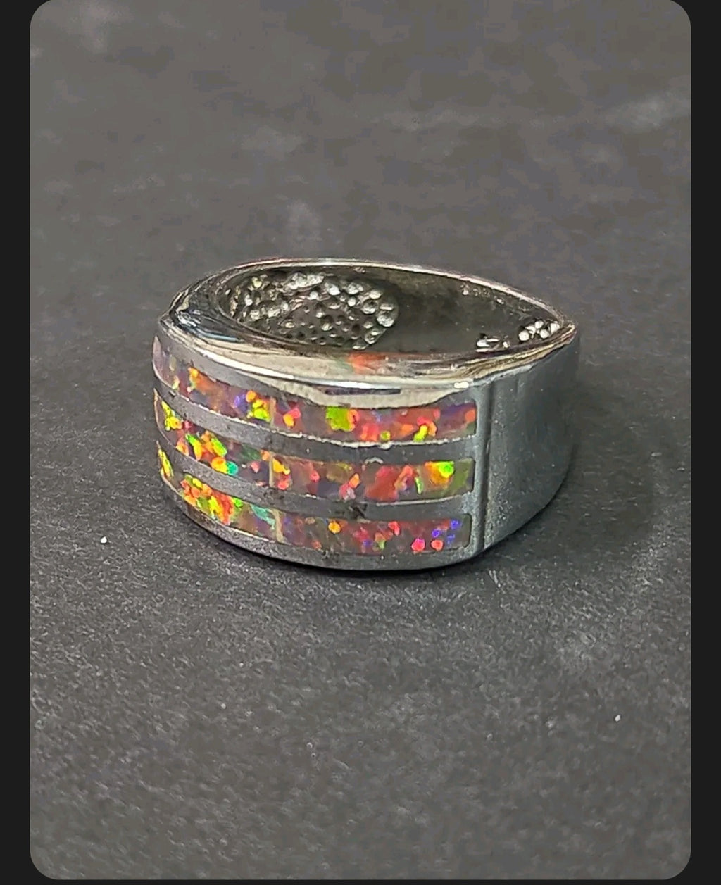Oddly Darling Vintage wide band ring featuring three horizontal channels of iridescent multi-colored opal inlay.