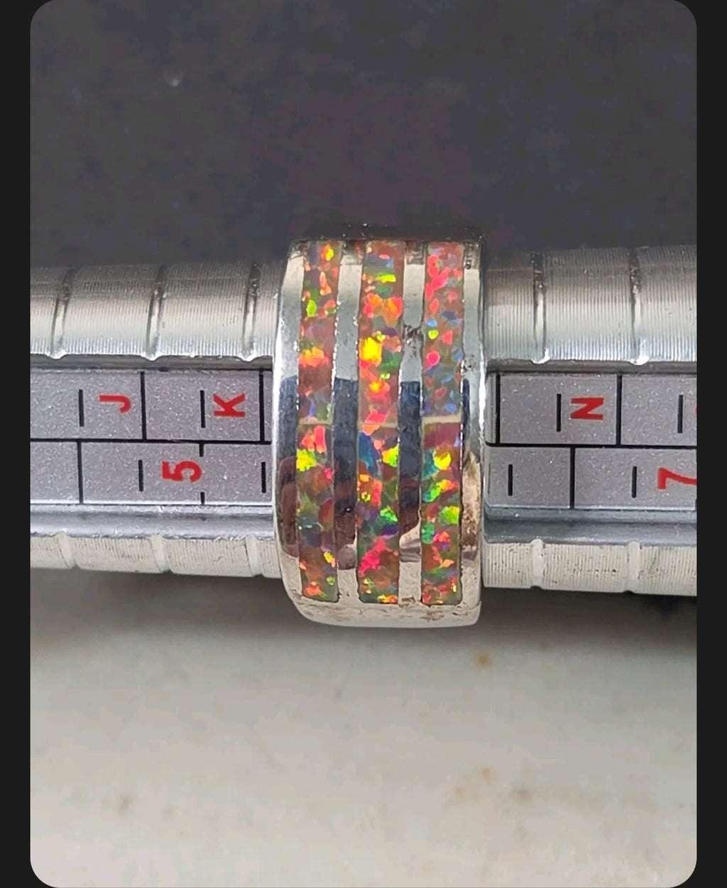 Oddly Darling Vintage wide band ring featuring three channels of iridescent multi-colored opal inlay on silver-tone