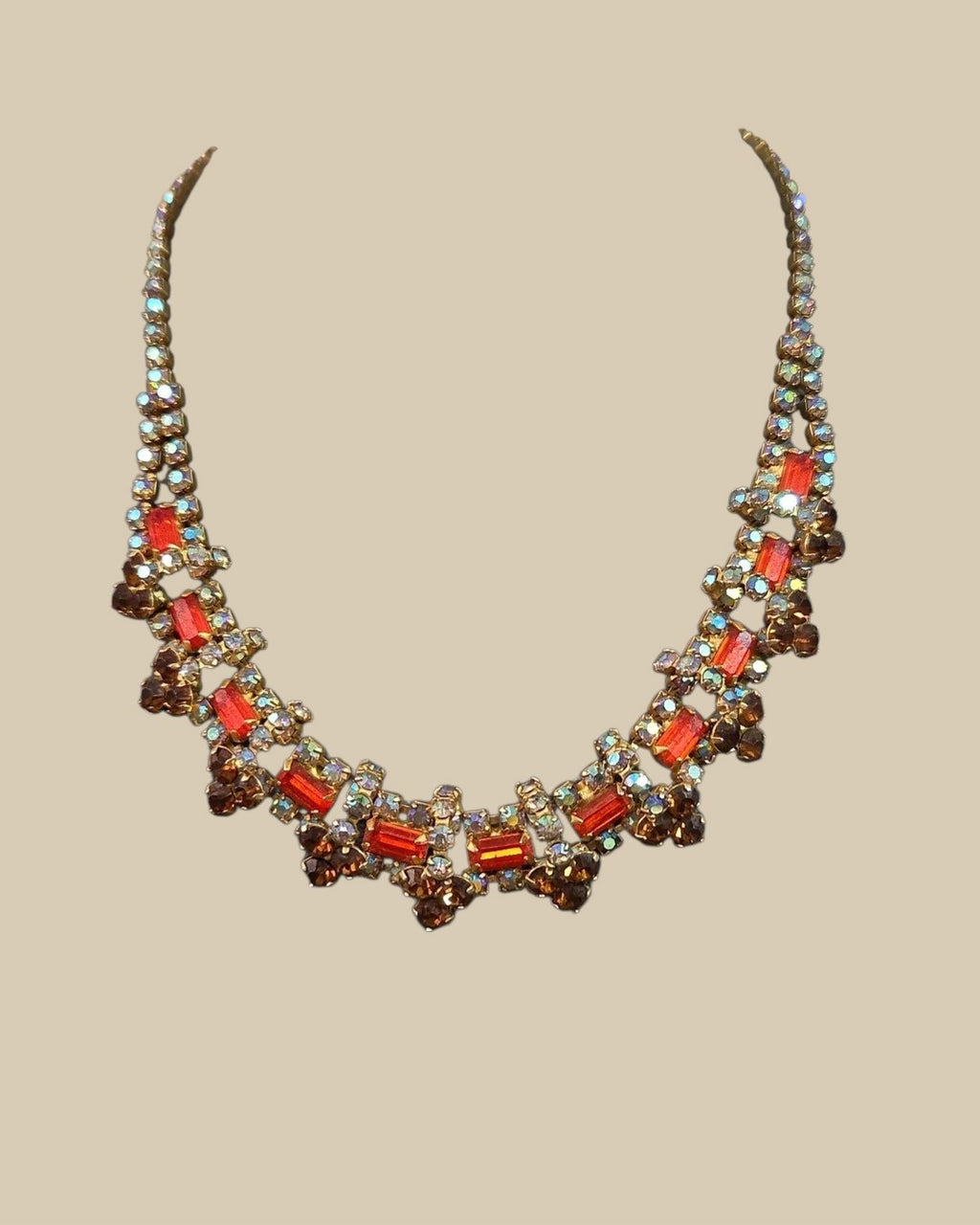 Oddly Darling Vintage collar necklace featuring orange and amber crystals with iridescent accents in a gold-tone setting