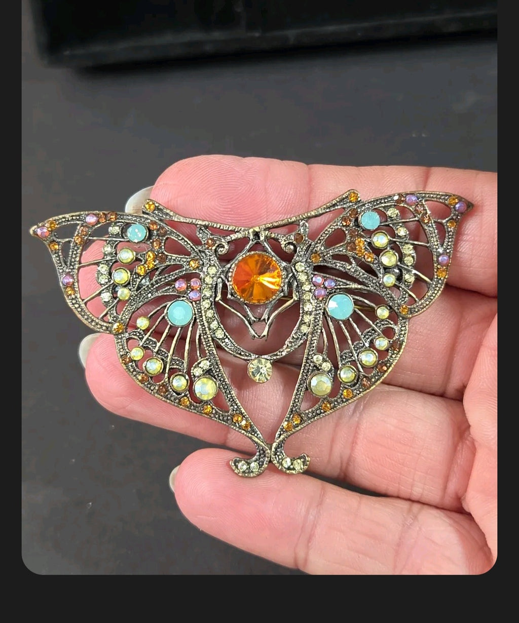 Oddly Darling Vintage ornate moth brooch with antique bronze metal, amber center stone, and turquoise crystal accents.