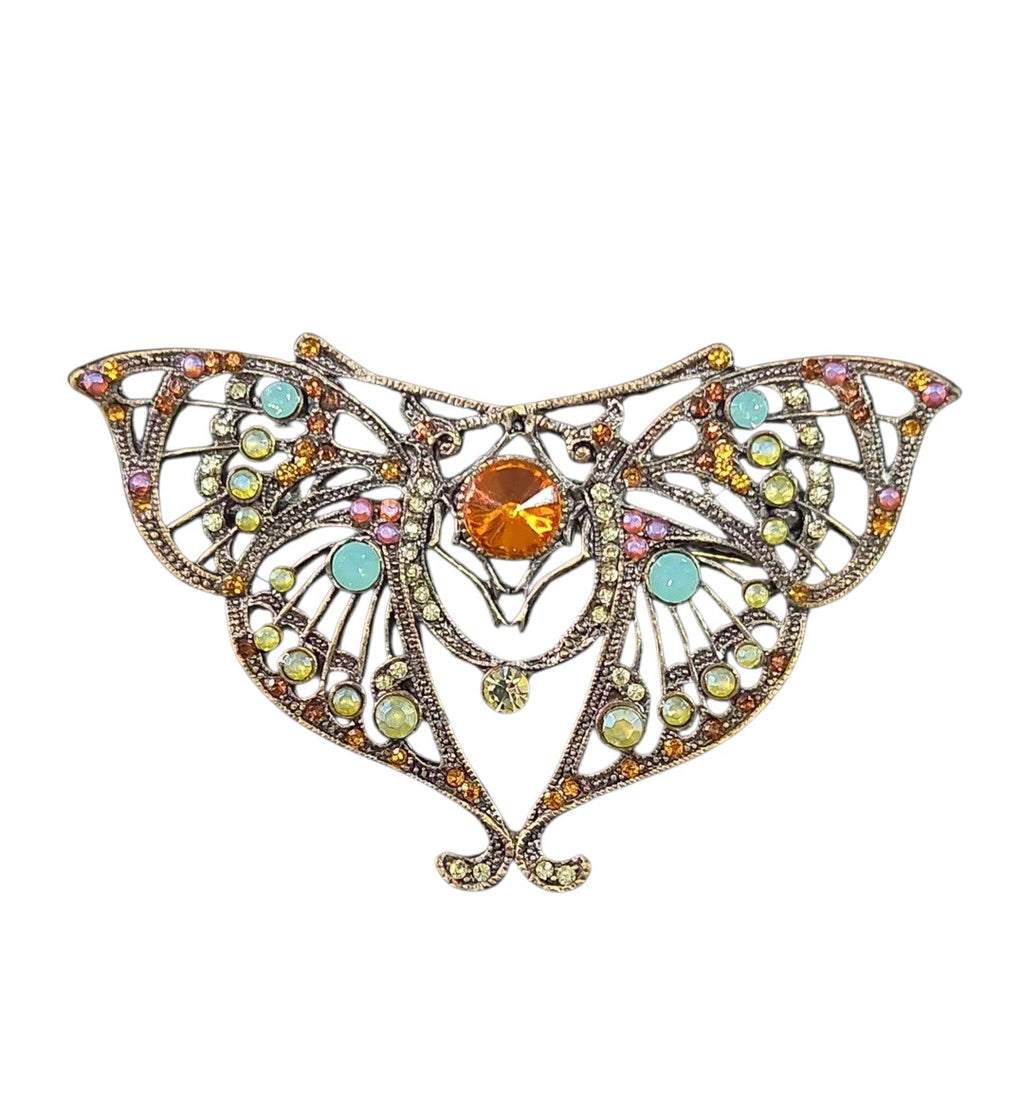 Oddly Darling Vintage ornate moth brooch with antique bronze metal, amber center stone, and colorful crystal accents.