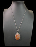 Oddly Darling Vintage oval agate pendant necklace with a silver-tone beaded frame on a delicate chain.