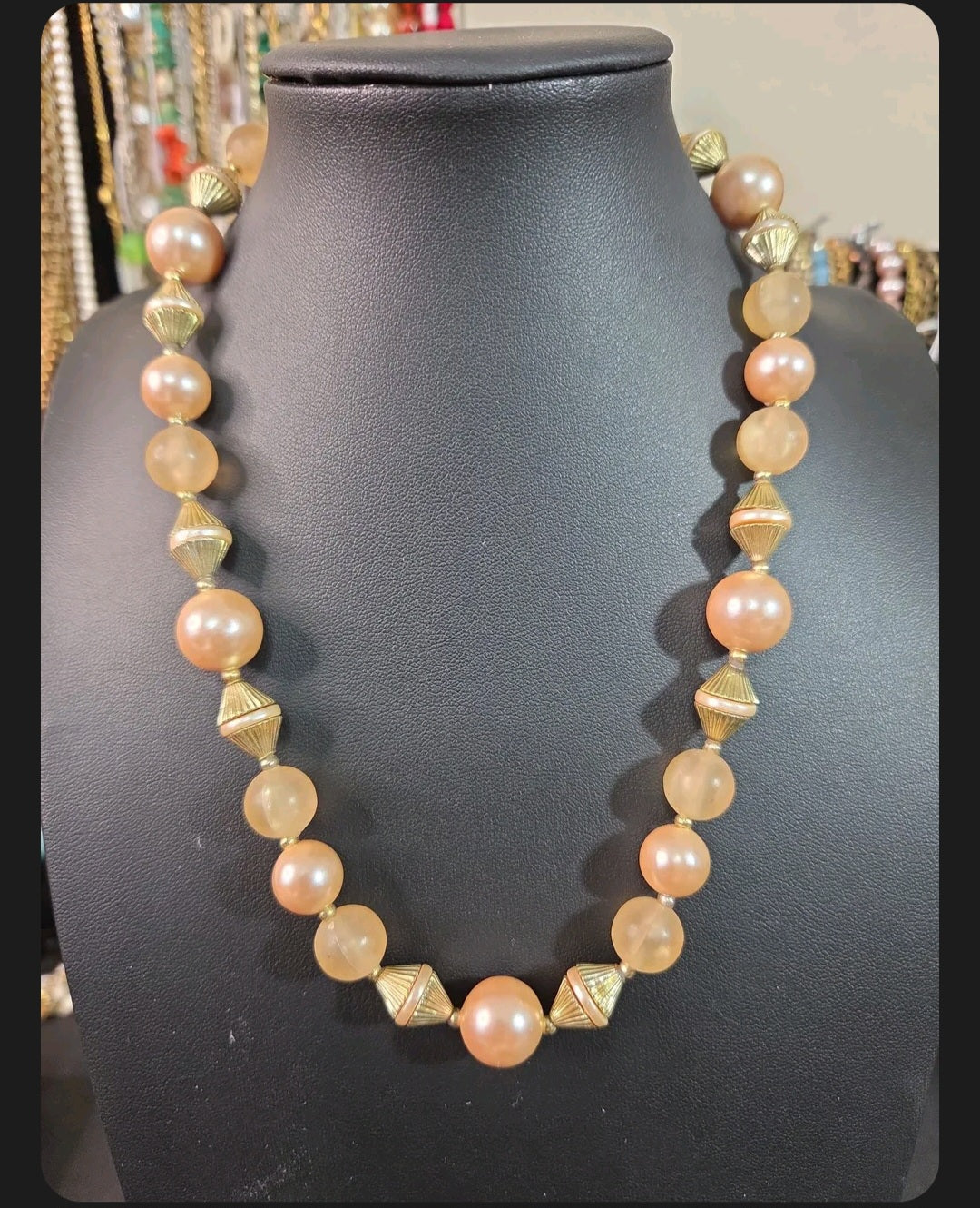 Oddly Darling Vintage statement necklace with peach faux pearls, frosted beads, and gold-tone fluted spacers.