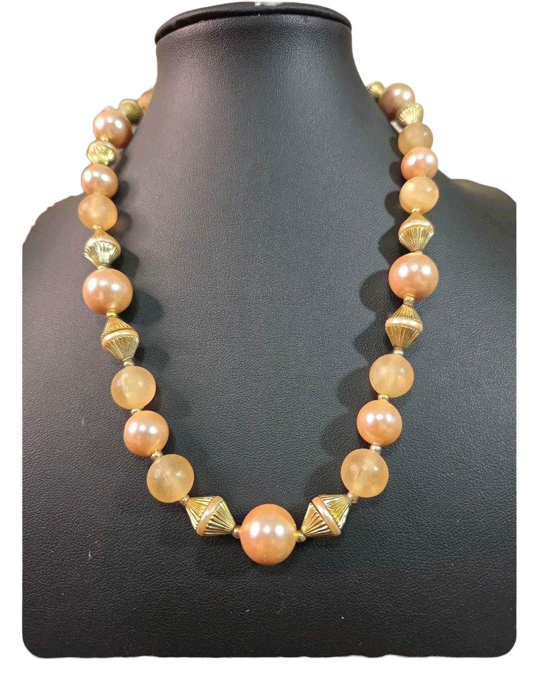 Oddly Darling Vintage statement necklace with peach faux pearls, frosted beads, and gold-tone fluted spacers.