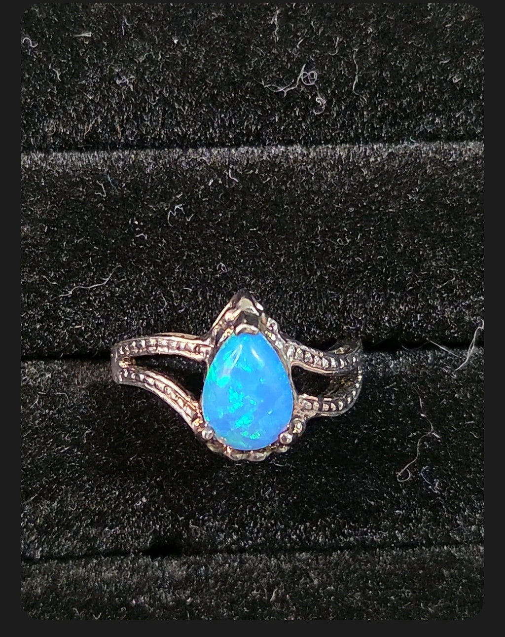 Oddly Darling Vintage pear-shaped blue opal statement ring with a textured silver-tone split-shank band.