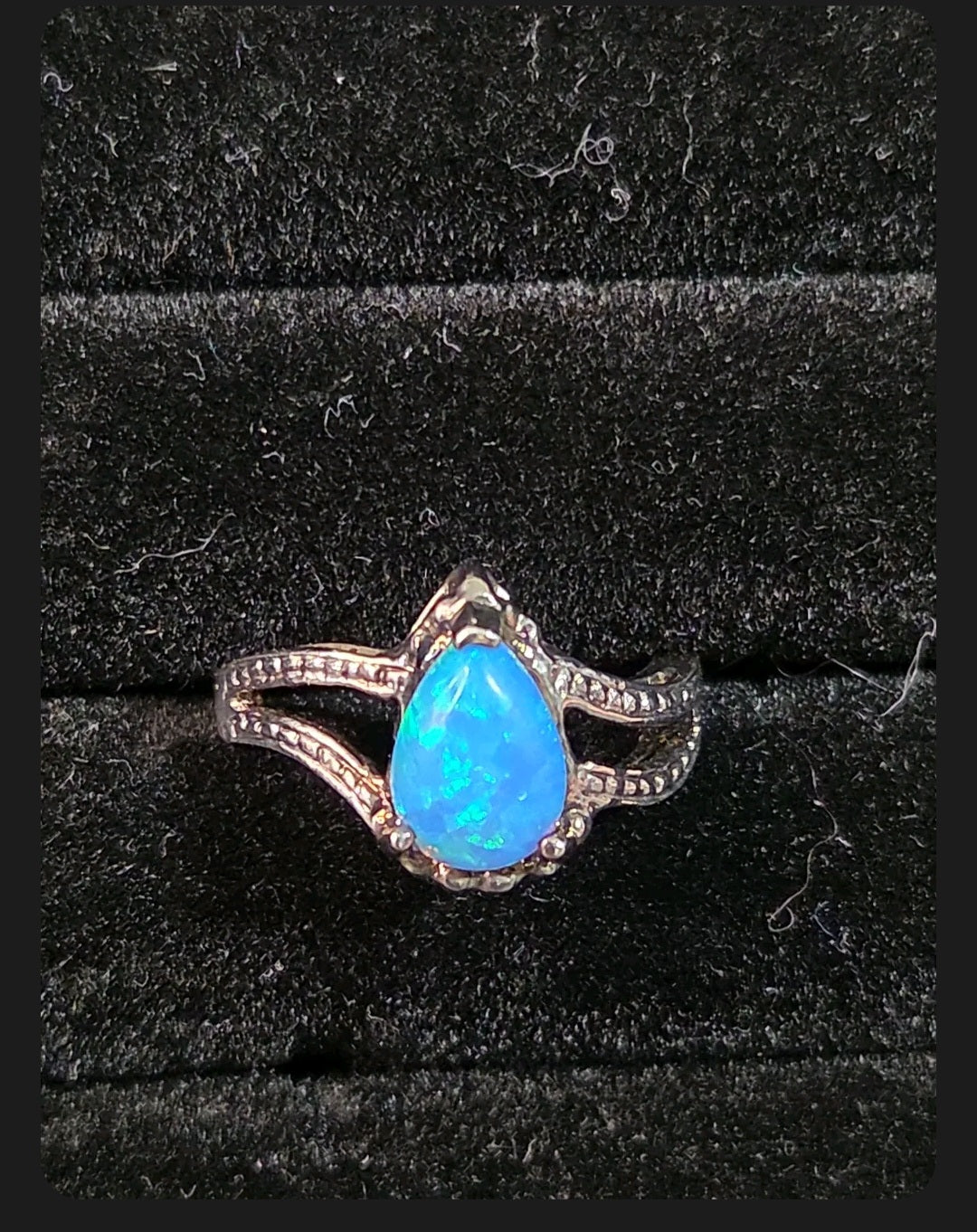 Oddly Darling Vintage pear-shaped blue opal statement ring with a textured silver-tone split-shank band.