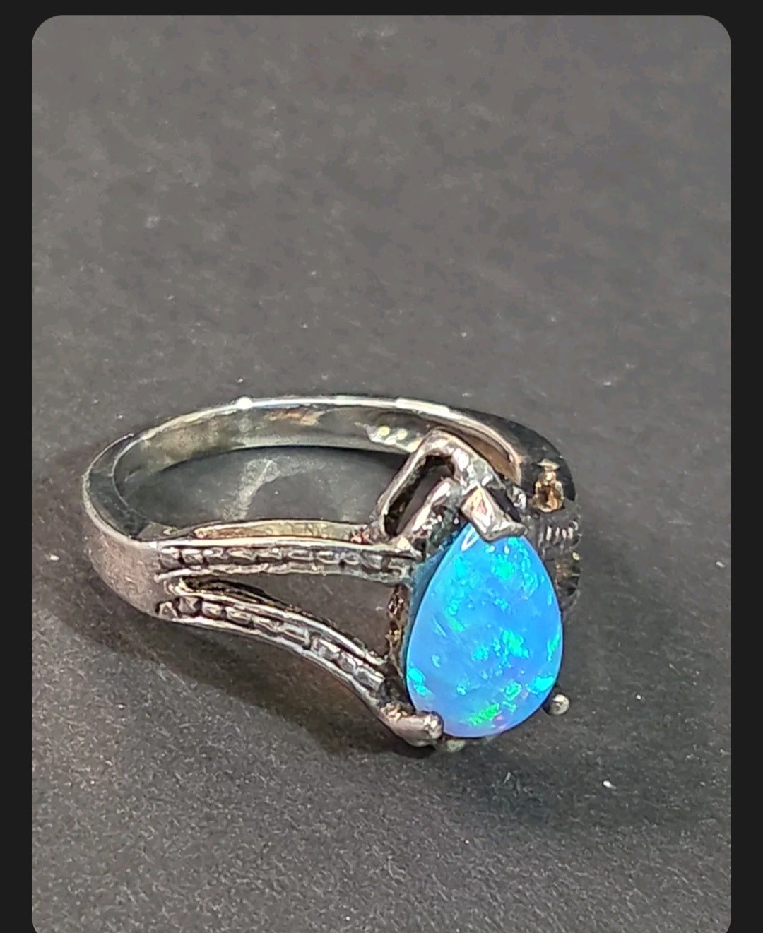 Oddly Darling Vintage pear-shaped blue opal statement ring with a textured silver-tone split-shank band.