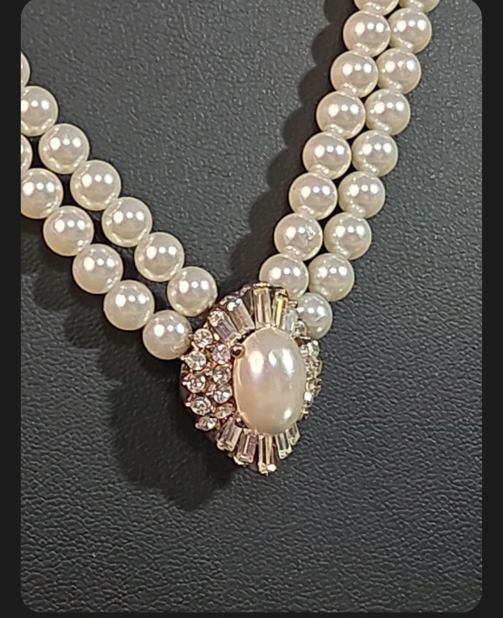 Oddly Darling Vintage double-strand cream faux pearl necklace with a crystal-encrusted oval brooch pendant.