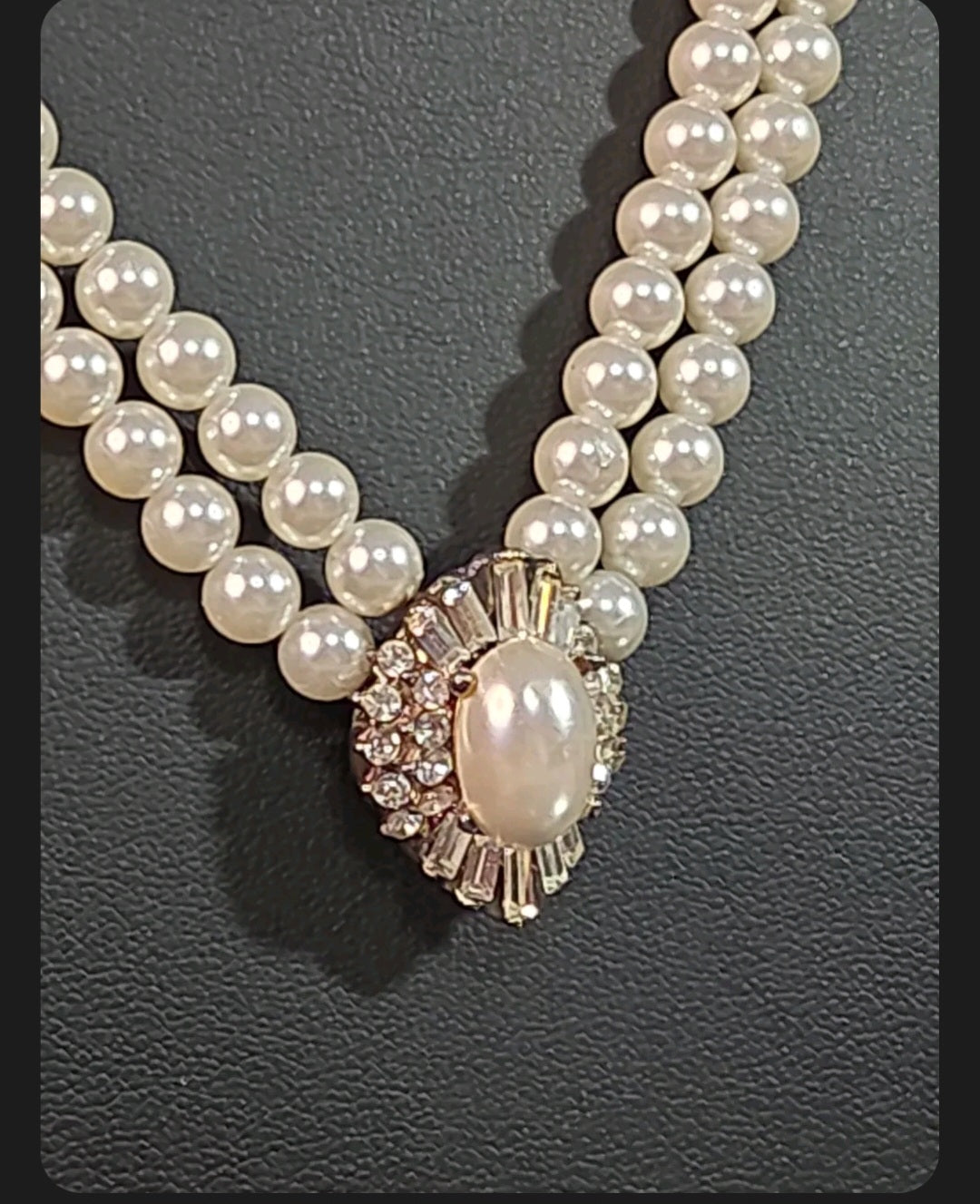 Oddly Darling Vintage double-strand cream faux pearl necklace with a crystal-encrusted oval brooch pendant.